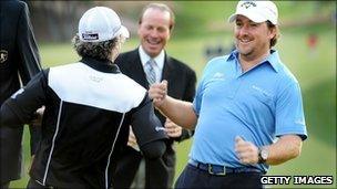 Graeme McDowell celebrates after winning the Chevron World Challenge