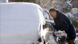 Man digging snow