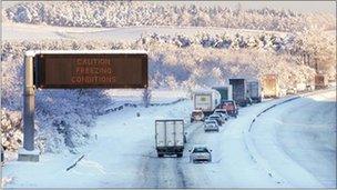 Vehicles travel eastbound along the M8 motorway near Harthill,