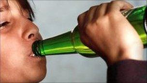 Teenager drinking alcohol