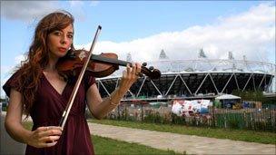 Musician outside the Olympic Stadium in east London