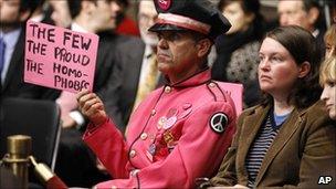 Gay protestor at congressional hearing