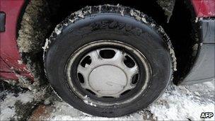 Normal car tyre in the snow