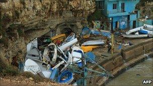 Fishing boats damaged by high waves near the Lebanese capital, Beirut