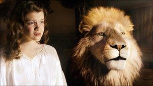 Georgie Henley with Aslan in The Chronicles of Narnia: The Voyage of the Dawn Treader