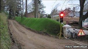 Temporary traffic lights in Dixcart Lane, Sark