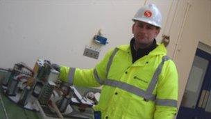 Berkeley site manager Sean Sargent with a model of the nuclear power plant, the way it was whilst operational