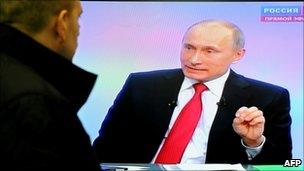 Russian Prime Minister Vladimir Putin speaks in a televised discussion with an audience on 16 December 2010