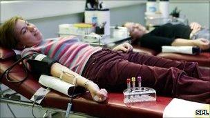 Woman donating blood