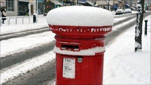 Postbox covered in snow