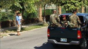 Soldiers patrol in El Salvador