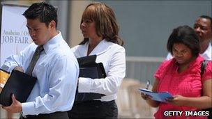 Job seekers waiting to hand in resumes