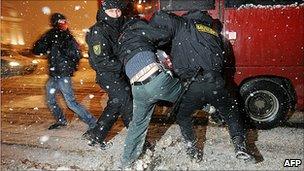 Police arrest an activist in Minsk, 20 Dec 10