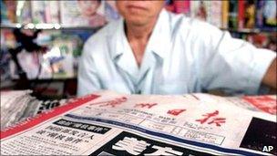 A newsstand vendor in China