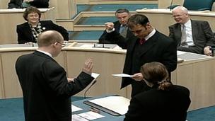 Sheridan being sworn in at the Scottish Parliament