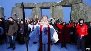 Druids led by Arthur Pendragon celebrate the winter solstice at Stone Henge