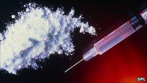 A syringe and heroin powder used by a heroin addict (archive image)