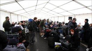 Passengers wait at Heathrow