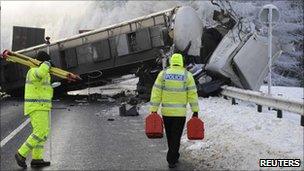 Police officers at scene of A9 crash near Dunkeld