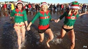 [L-R]: Anna Davies, Katrina Brown and Elinor Jones enjoy the annual Porthcawl swim