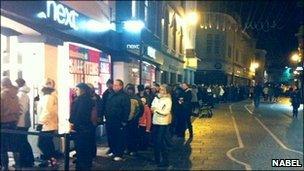 Hundreds queue outside a clothes shop in Queen Street before the doors open at 0500 GMT on sale day