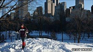 A woman on skis in New York's Central Park on 27 December