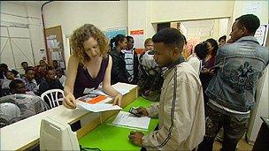 Migrants queuing at clinic in Tel Aviv