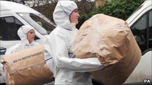 Forensic officers remove evidence from Jo Yeates' flat