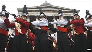 A marching band rehearses for the parade