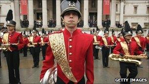 A marching band rehearses for the parade