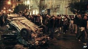 A car in front of a church in Alexandria where a bomb left several people dead, 1 January 2011