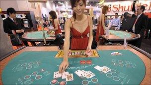 File image of croupier in Macau casino