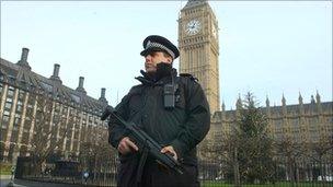 Armed officer outside parliament