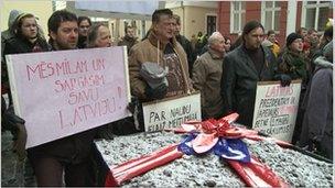 Latvians protest against the property scheme