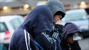 Youths in hooded tops