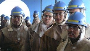 Atlantico Sul trainees wearing safety clothing