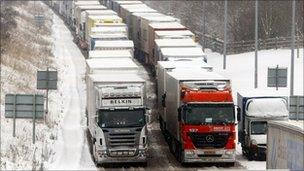 Lorries queue on the M20 in Kent during December's cold weather