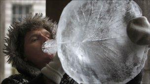 Man blowing ice horn