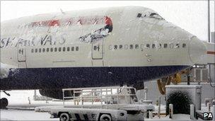 A snow-covered BA plane