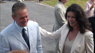 Catherine Zeta Jones and Michael Douglas on a visit to the Longfields Centre in 2005