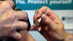 Flu vaccine being given