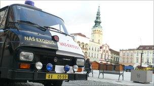 An ambulance with the slogan 'Our exodus - your exitus'