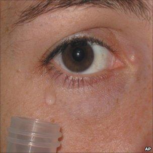 A woman's tear being collected