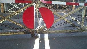 Damaged level crossing