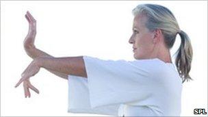 Woman practising Tai Chi