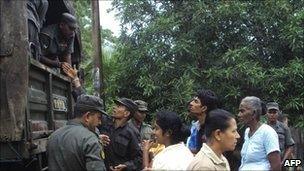 Troops distribute rations to flood victims in the eastern district of Polonnaruwa