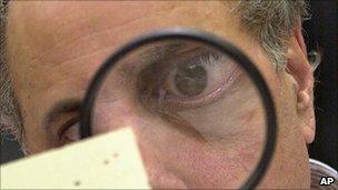 Man with magnifying glass