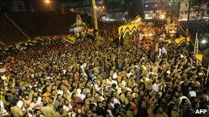 Hindu devotees pray at the Sabarimala temple, Kerala