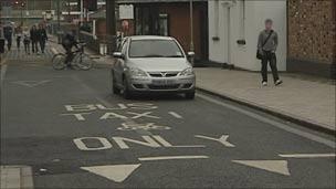 Car using bus lane