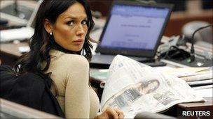 Nicole Minetti reads a newspaper during a meeting at the Lombardy regional headquarters in Milan, 18n January